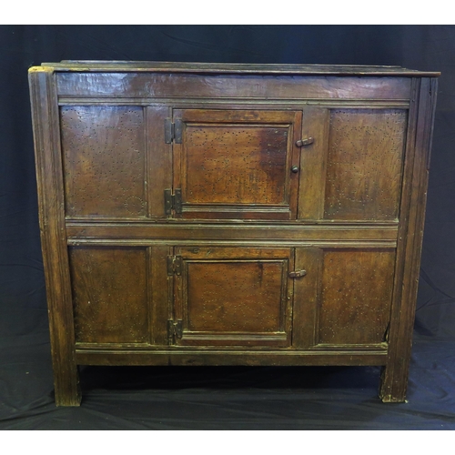 1638 - An 18th century oak dresser, with ledged top, with panelled cupboard door having pierced floral deco... 