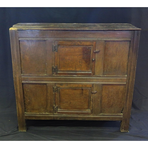 1638 - An 18th century oak dresser, with ledged top, with panelled cupboard door having pierced floral deco... 