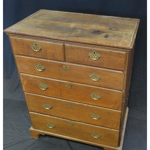 1639 - An 18th century oak chest in two parts, of rectangular outline containing two short and four long gr... 