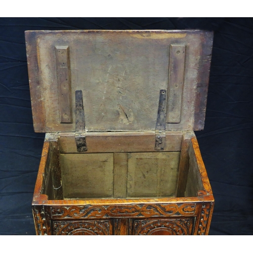 1640 - An antique oak small coffer, with rectangular top, the twin panelled front with lunette carved decor... 