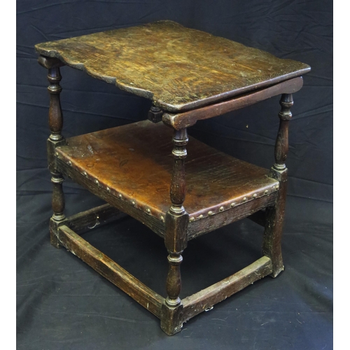 1642 - An antique small coffer, with a rectangular top, lunette carved front panel, with plain sides and ba... 