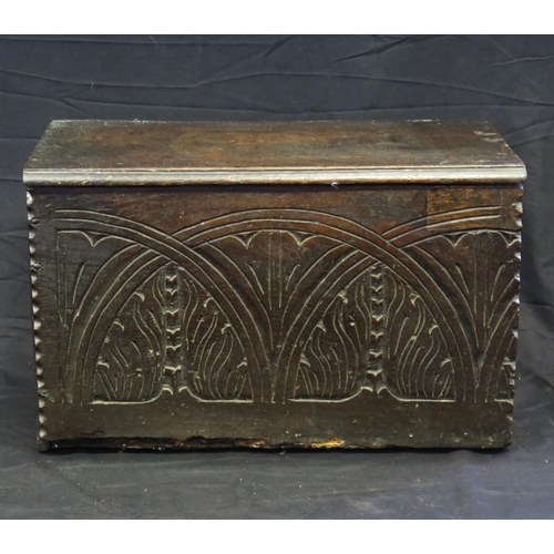 1642 - An antique small coffer, with a rectangular top, lunette carved front panel, with plain sides and ba... 