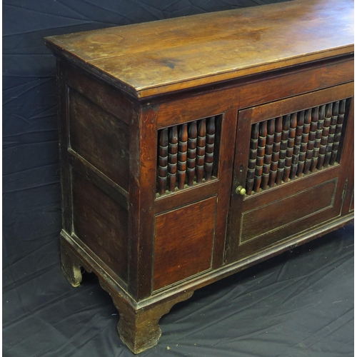 1646 - A late 18th century oak food hutch, with rectangular top with panelled and spindle decorated door en... 