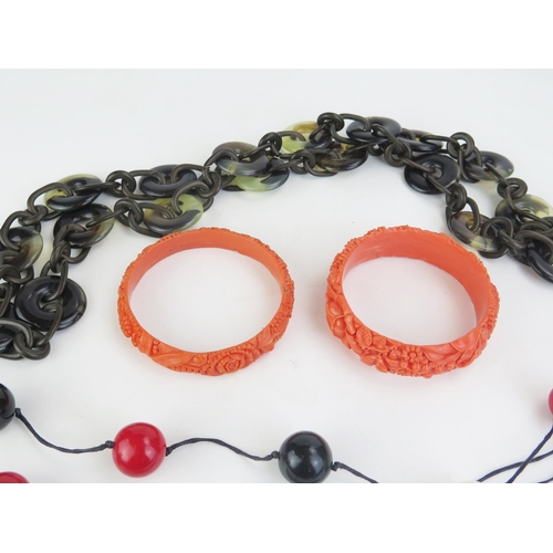 165 - A Faux Baltic Amber Necklace with Kenneth Lane Tag, largest 21.5mm, c. 17