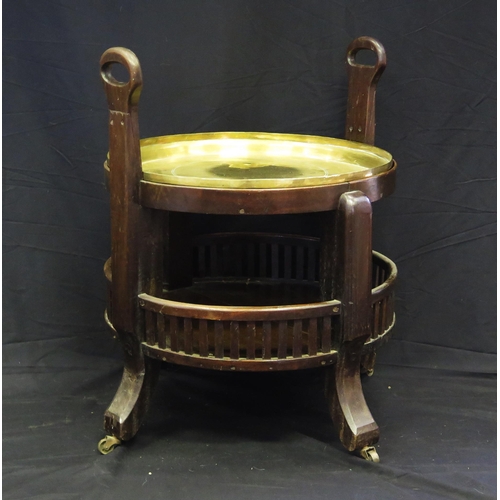 1651 - A mahogany and brass two-tier circular stand, with inset brass dish with pricked initials JP, with g... 