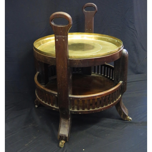 1651 - A mahogany and brass two-tier circular stand, with inset brass dish with pricked initials JP, with g... 