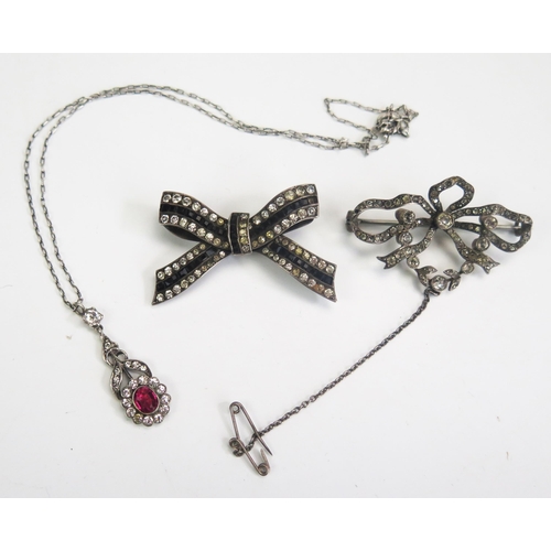 173 - A Silver and Paste Bow Brooch (40mm), .900 silver bow brooch set with black and white paste (clasp n... 