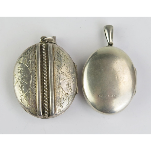 176 - A Victorian Silver and a precious white metal locket, 41.8g