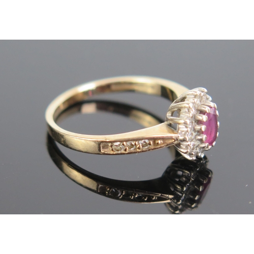 179 - A 9ct Gold, Ruby and Diamond Ring, hallmarked, size K.5, 9.5x8.5mm head, 2.5g