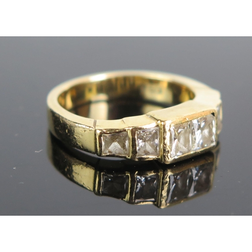 188 - An 18ct Gold and Princess Cut Diamond Ring, stamped 750, size M.5, 6.68g. Sold with South African ce... 