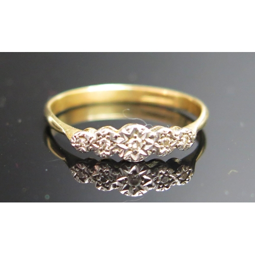 207 - An 18ct Gold, Platinum and Diamond Five Stone Illusion Set Ring, stamped marks, size R,5, 2.23g and ... 