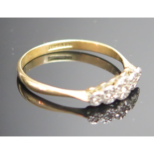 207 - An 18ct Gold, Platinum and Diamond Five Stone Illusion Set Ring, stamped marks, size R,5, 2.23g and ... 