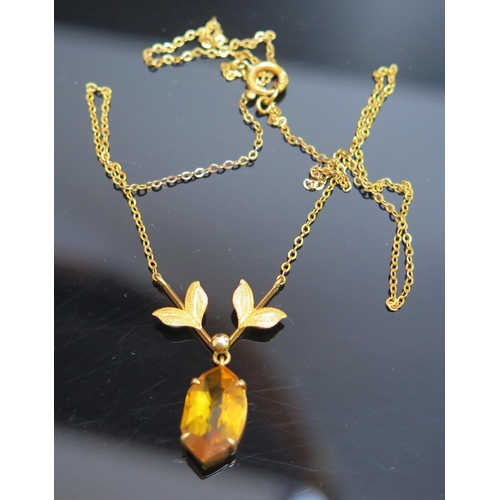 209 - A 9ct Gold and Orange Stone Necklace on an integral chain, 16.5