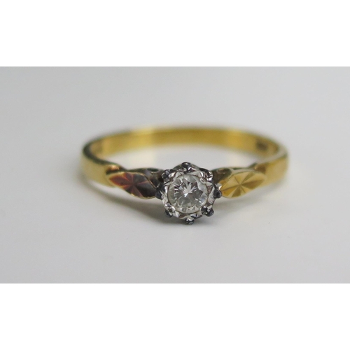 215 - A Modern 18ct Gold and Diamond Solitaire Ring, c. 3.3mm illusion set stone, hallmarked, size N.25, 2... 