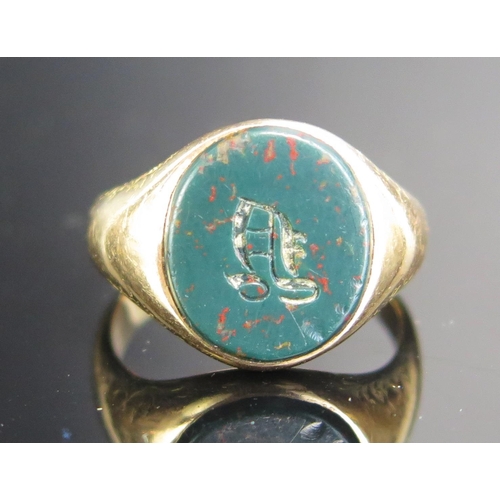 225 - A Precious Yellow Metal and Bloodstone Signet Ring, KEE tested as 14ct, size P.25, 8.13g