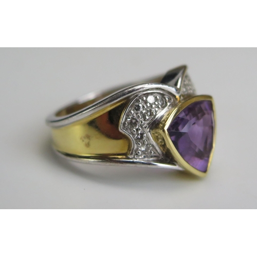 227 - A Modern 18ct Gold, Diamond and Amethyst? Ring, stamped 750, size M, 7.74g