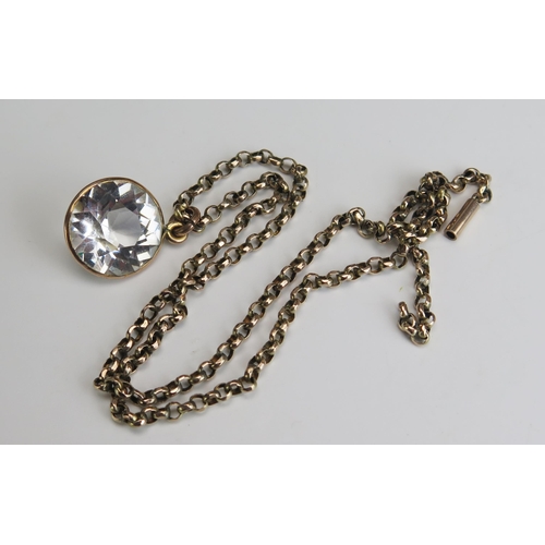 228 - A 9ct Gold Belcher Chain with barrel clasp and quartz pendant in a precious yellow metal setting17.5... 