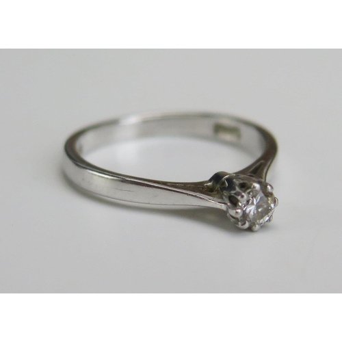 229 - An 18ct White Gold Diamond Solitaire Ring, c.3.5mm stone, size k.5, hallmarked, 2.35g