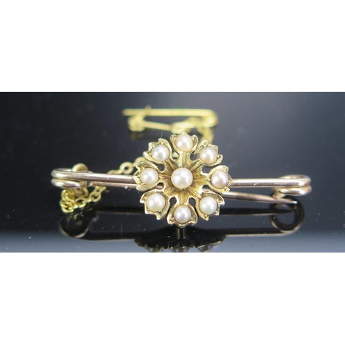 233 - A Flower Head untested Pearl Brooch in an unmarked precious yellow metal setting, KEE tested as 15ct... 