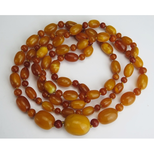 248 - A Large Baltic Amber Bead Necklace, largest bead c. 31.6x25.9mm, 62