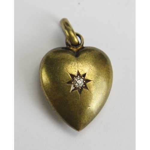 253 - An Antique 15ct Gold and Old Cur Diamond Heart Shaped Locket, 22mm drop, stamped 1CT, 2.69g