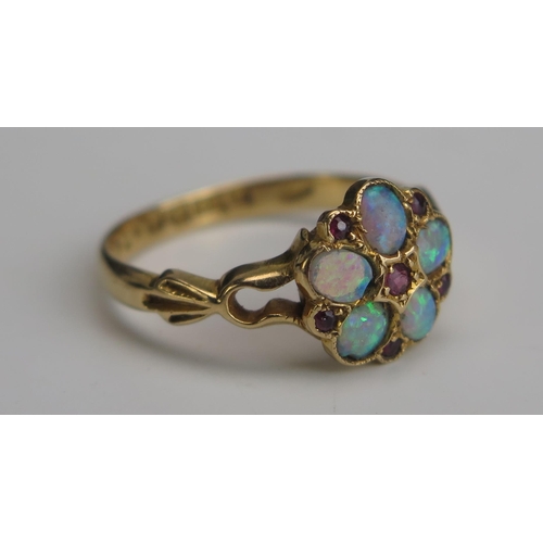 258 - An Antique 18ct Gold, Opal and Ruby Cluster Ring, 10mm head, Chester 1909, size M.25, 3g. Two stones... 