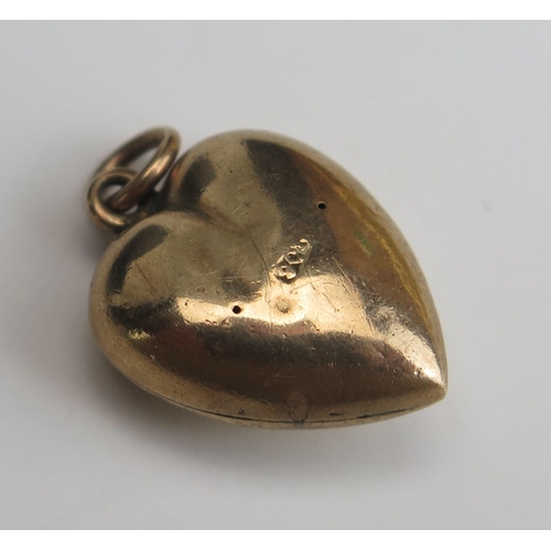 265 - A 9ct Gold and untested Pearl Heart Shaped Pendant, stamped 9CT, 25mm drop, 2.24g