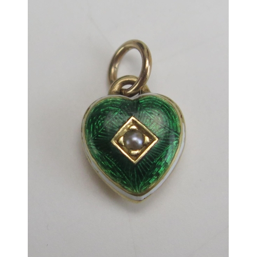 267 - A Green Guilloche Enamel and untested Pearl Heart Shaped Pendant in unmarked precious yellow metal, ... 