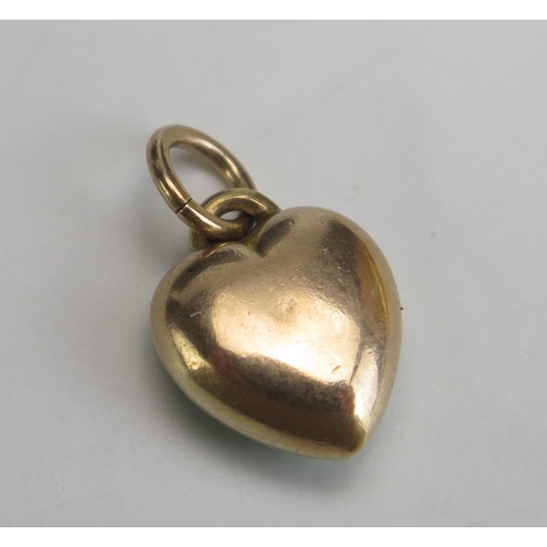 267 - A Green Guilloche Enamel and untested Pearl Heart Shaped Pendant in unmarked precious yellow metal, ... 