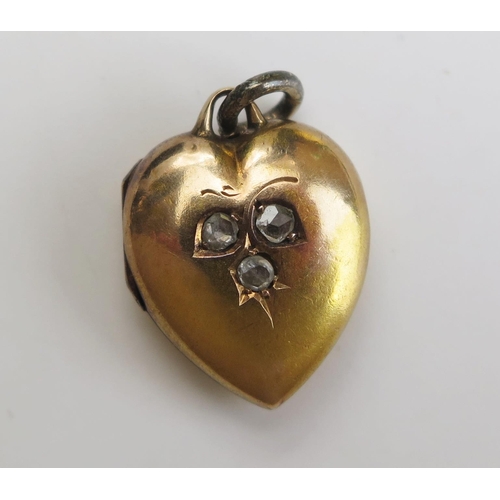 273 - A Victorian 15ct Gold and Rose Cut Diamond Heart Shaped Pendant, 20.5mm drop, stamped 15CT, 2.54g