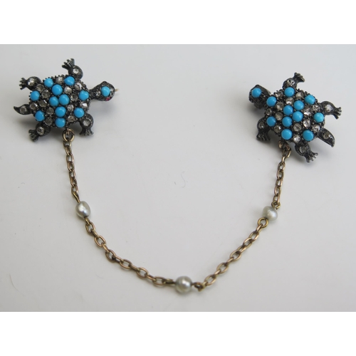 274 - A Victorian Tortoise Collar Clip mounted with rose cut diamonds and turquoise in a precious white me... 