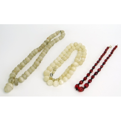 286 - Two Felspar Necklaces and a faceted red plastic bead necklace