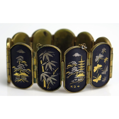 292 - A Japanese Damascene 24K Gold inlaid Panel Bangle, 32mm wide