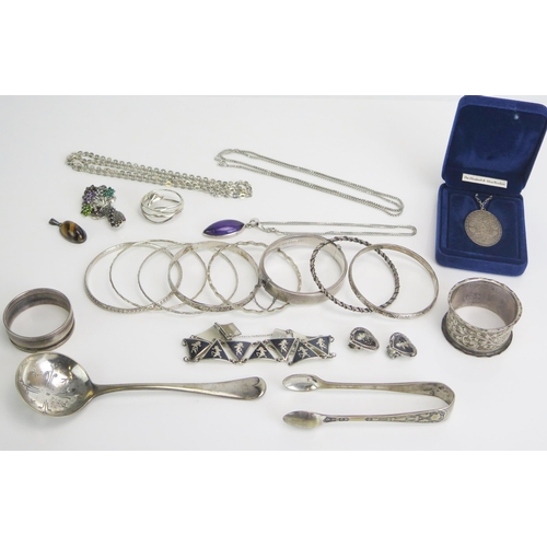 293 - A Large Selection of Silver Jewellery including a floral bouquet brooch, hinged bangle, silver neckl... 