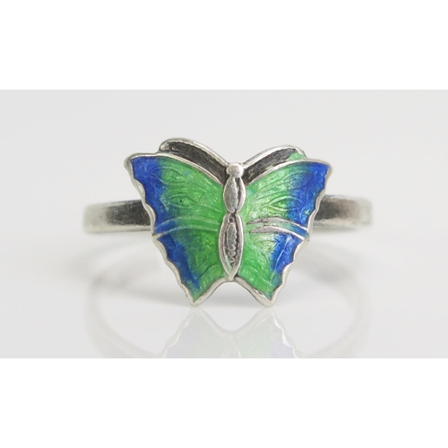 307 - A Silver and Enamel Butterfly Ring, size M.5