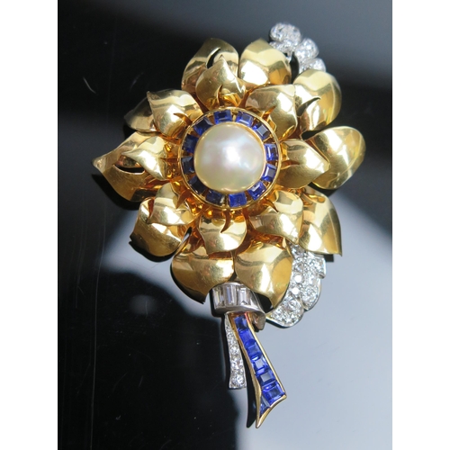 318 - A Deco, Sapphire, Diamond and Pearl Floral Brooch in a precious yellow and white metal setting, 66mm... 