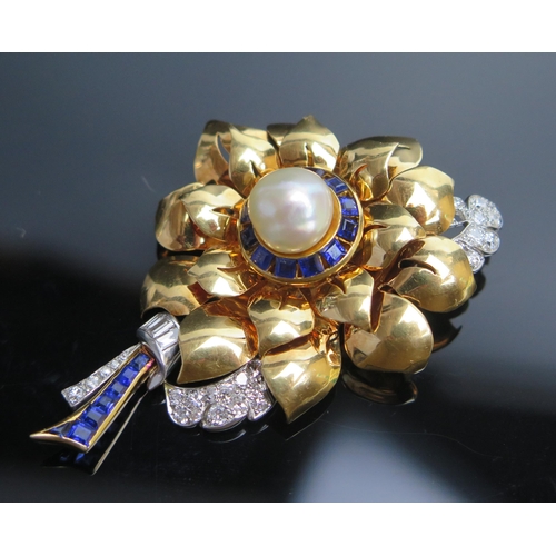 318 - A Deco, Sapphire, Diamond and Pearl Floral Brooch in a precious yellow and white metal setting, 66mm... 