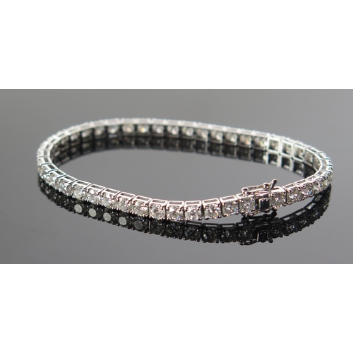 326 - An 18ct White Gold and Diamond Tennis or Line Bracelet, 8.75ct of brilliant round cuts, 7