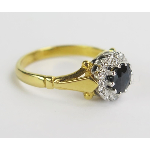 33 - An 18ct Gold, Sapphire and Diamond Cluster Ring, 9mm head, stamped 18CT, size L, 4g
