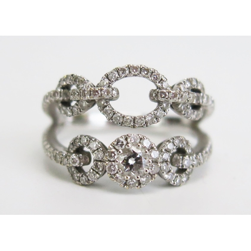 330 - An 18ct White Gold and Diamond Split Shank Ring, .89ct, size L.5, c. 4.51g. Presented in a Cartier b... 