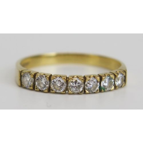 332 - An 18ct Gold and Diamond Seven Stone Ring, hallmarked, c. 2.2mm brilliant round cuts, size O.5, 2.08... 