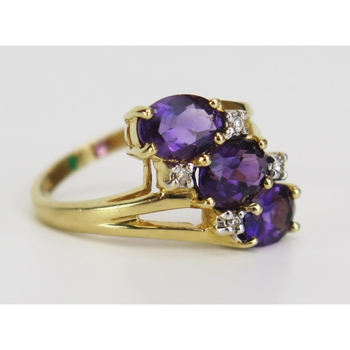 353 - A 14K Gold, Amethyst and Diamond Crossover Ring, size L.25, 3.6g