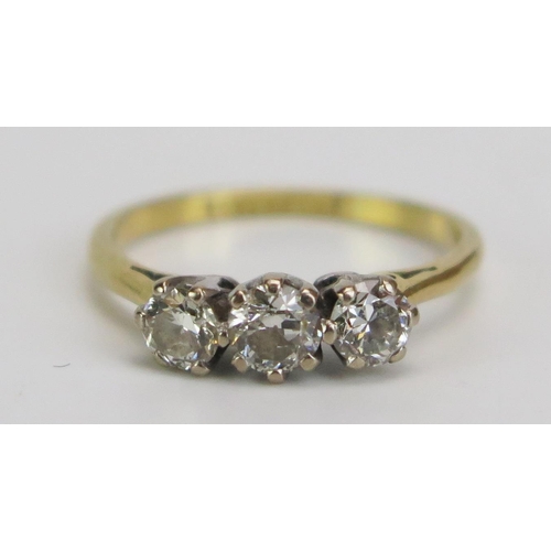 361 - An 18ct Gold and Diamond Three Stone Ring, c. 3.8mm stone, stamped marks, size I.75, 2.16ct