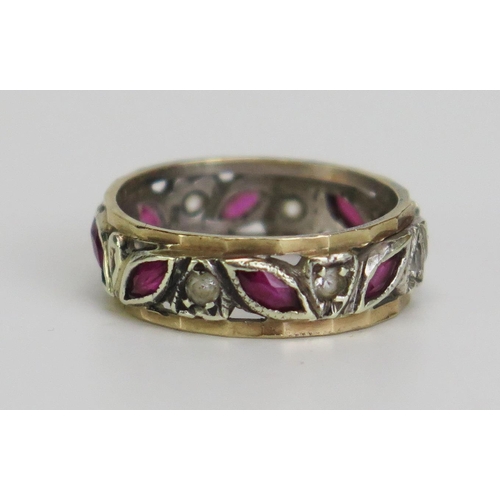 368 - A 9ct Gold, Ruby and Diamond Eternity Ring, hallmarked, 6mm wide, size J, 2.81g