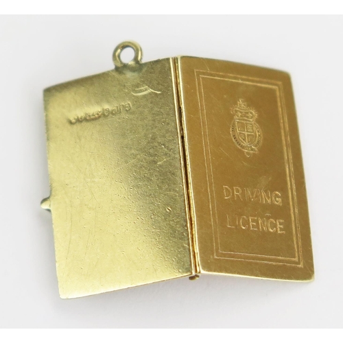 40 - A 9ct Gold Driving Licence Charm hinged to open, hallmarked, 2.38g
