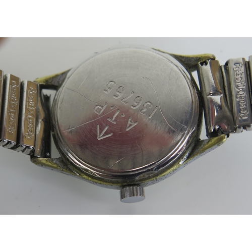 453 - A WWII TIMOR 'One of the Dirty Dozen' Wristwatch, 31mm case back marked A.T.P. 136765. Needs attenti... 