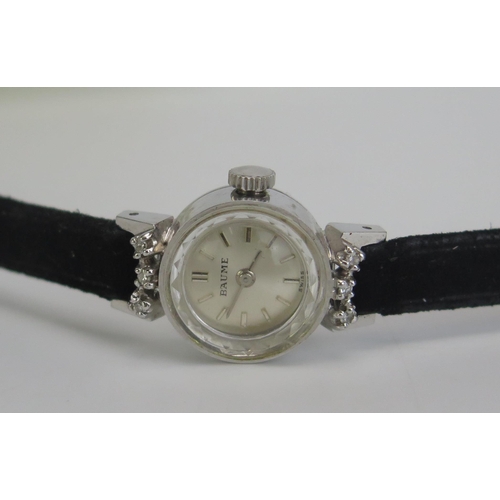 464 - A Ladies BAUME 9ct White Gold and Diamond Wristwatch, 15mm case, c. 1968. Running, boxed and with pa... 