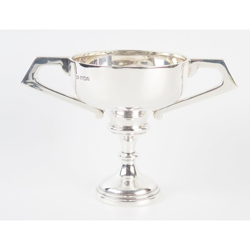 632 - A George V silver twin handle trophy cup, maker Viners Ltd, Sheffield, 1931,  of plain form with pie... 