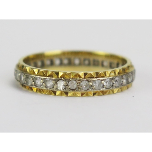 68 - An 18ct Gold and Diamond Eternity Ring, c. 1.6mm stones, 4mm wide band, size N.25 2.74g