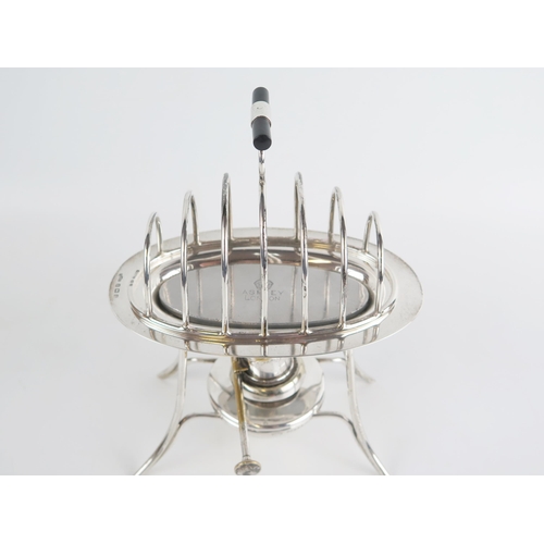 718 - A George V silver six division toast rack and warmer, maker Asprey & Co Ltd, Birmingham, 1913, of ov... 